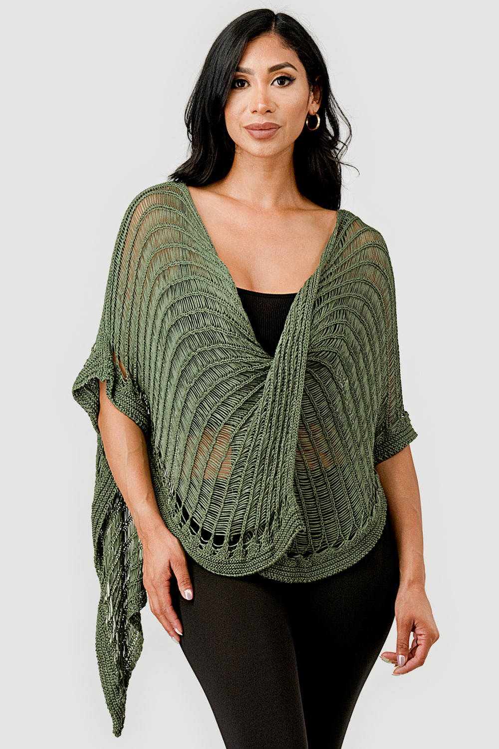 Front view of asymmetric layered crochet top on model